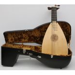 A contemporary 12 string lute and carrycase, c.1990.