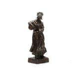 RICHARD AURILI (ITALIAN, 1834-1914): A PATINATED TERRACOTTA FIGURE OF A DUTCH GIRL POURING MILK