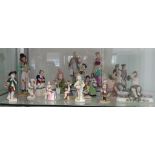 An interesting collection of British and Continental pottery an porcelain figures, 19th century,