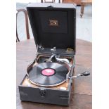 A 1930's vintage black leather cased His Master's Voice HMV gramophone, in good condition and in