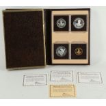 A cased set of Turks and Caicos 1980 proof coins, including a 100 crown, 5, 10 and 20 crown.