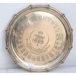 A .800 silver Ger: Somme circular tray with engraved armorial decoration, 34cm.