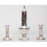 A Chester silver sugar shaker, 'flame' finial, octagonal body, 22.5cm high, c.1919, and a pair of