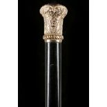 A FINE YELLOW METAL AND EBONISED HARDWOOD DRESS CANE. The crown of the yellow metal mushroom knop is