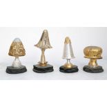 Four Stuart Devlin style mushroom, part hallmarked silver table decorations with enamelled