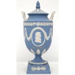 A Wedgwood 'Blue Jasper' dip vase and cover with upturned loop handles, applied with classical