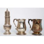 A late Victorian silver tankard, with chased decoration, another silver baluster tankard, and a