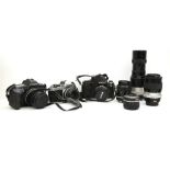 Photographic equipment; cameras, Canon EOS 600, Nikon black F2 7219876, Nikon FE 3870660, lenses;