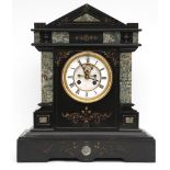 A late 19th century architectural mantle clock, black marble, green variegated marble decoration,