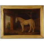 T.C. Winter, 19th century British school. 'Standing White Horse'. Oil on milled board, interior barn