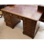 A Victorian mahogany double pedestal desk on plinth base, 135 x 60cm.