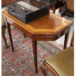 An Edwardian mahogany and crossbanded fold over card table, with canted corners, supported on