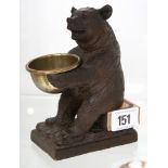 A late 19th Century Black Forest novelty smoking companion, well carved with a bear in seated