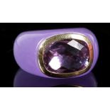 A 14 carat yellow gold, amethyst and purple hard stone ring, having hard stone shank (possibly