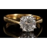 An 18 carat yellow gold and solitaire diamond ring, set round cut diamond of approx. 1.75 carats.