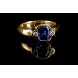 An 18ct gold, sapphire and diamond set ring. Sapphire: 2ct est.