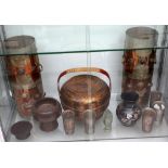 A pair of Tibetan storage canisters in copper with white metal embellishments and a set with
