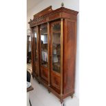 A good 19th century French mahogany simulating kingwood bibliotheque, with pineapple gilt metal