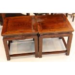 A pair of Oriental lounge tables, block legs with pipeline edging, further scroll detail and block