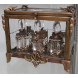 A bronze and glass casket containing 6 crystal scent bottles with gilt adornments, 23 x 15 x 19.