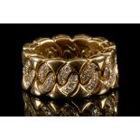 Bulgari, an 18 carat yellow gold and diamond set articulated eternity ring. Size: M