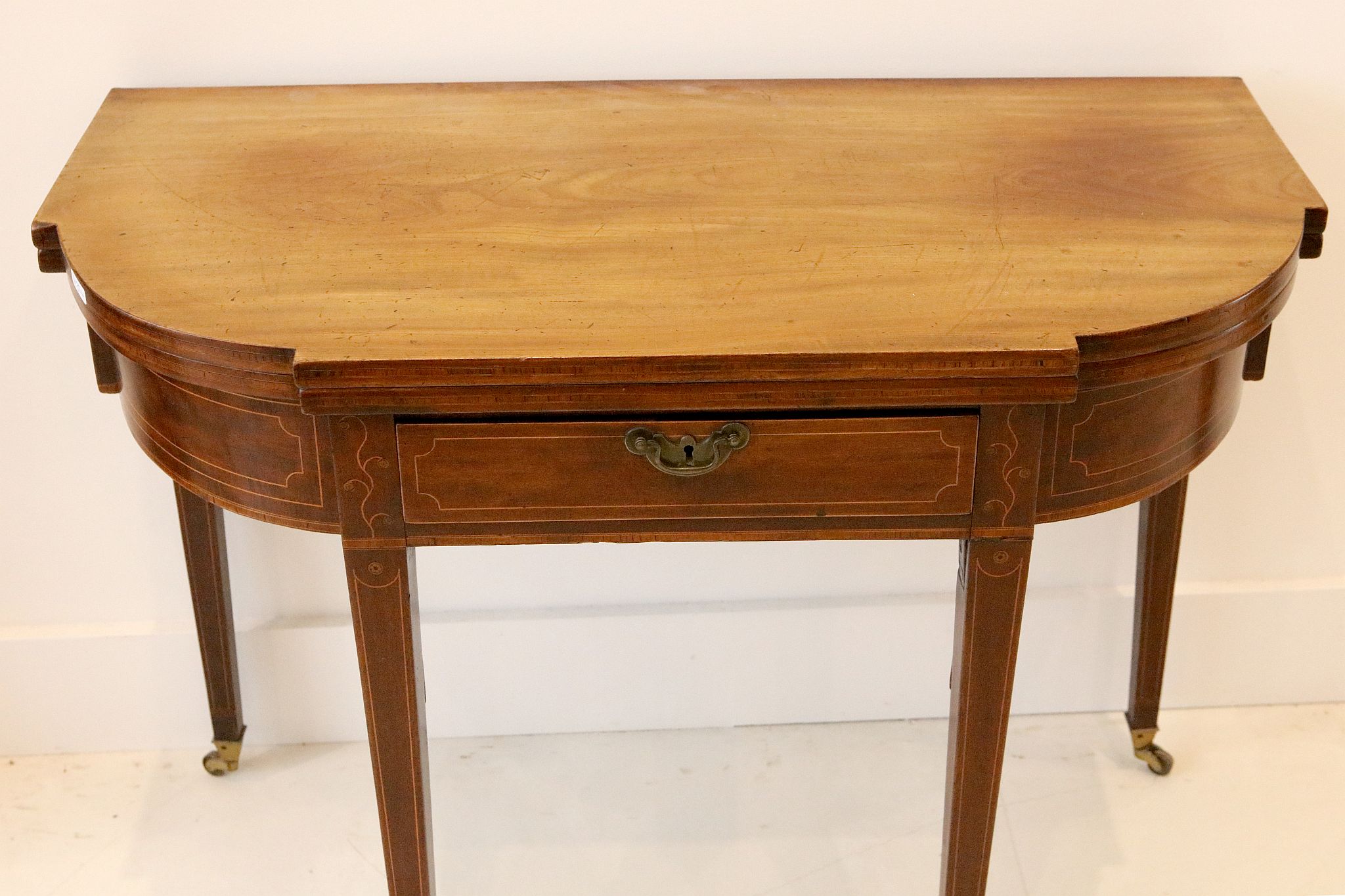 A George III mahogany card table, with shaped top and single drawer on square tapered legs and - Image 2 of 2
