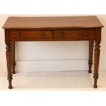 A Victorian mahogany hall table, twin drawers, tapering turned legs, 104cm wide.