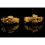 An unusual pair of Swedish 18 carat yellow gold hoop earrings, each having vineous decoration