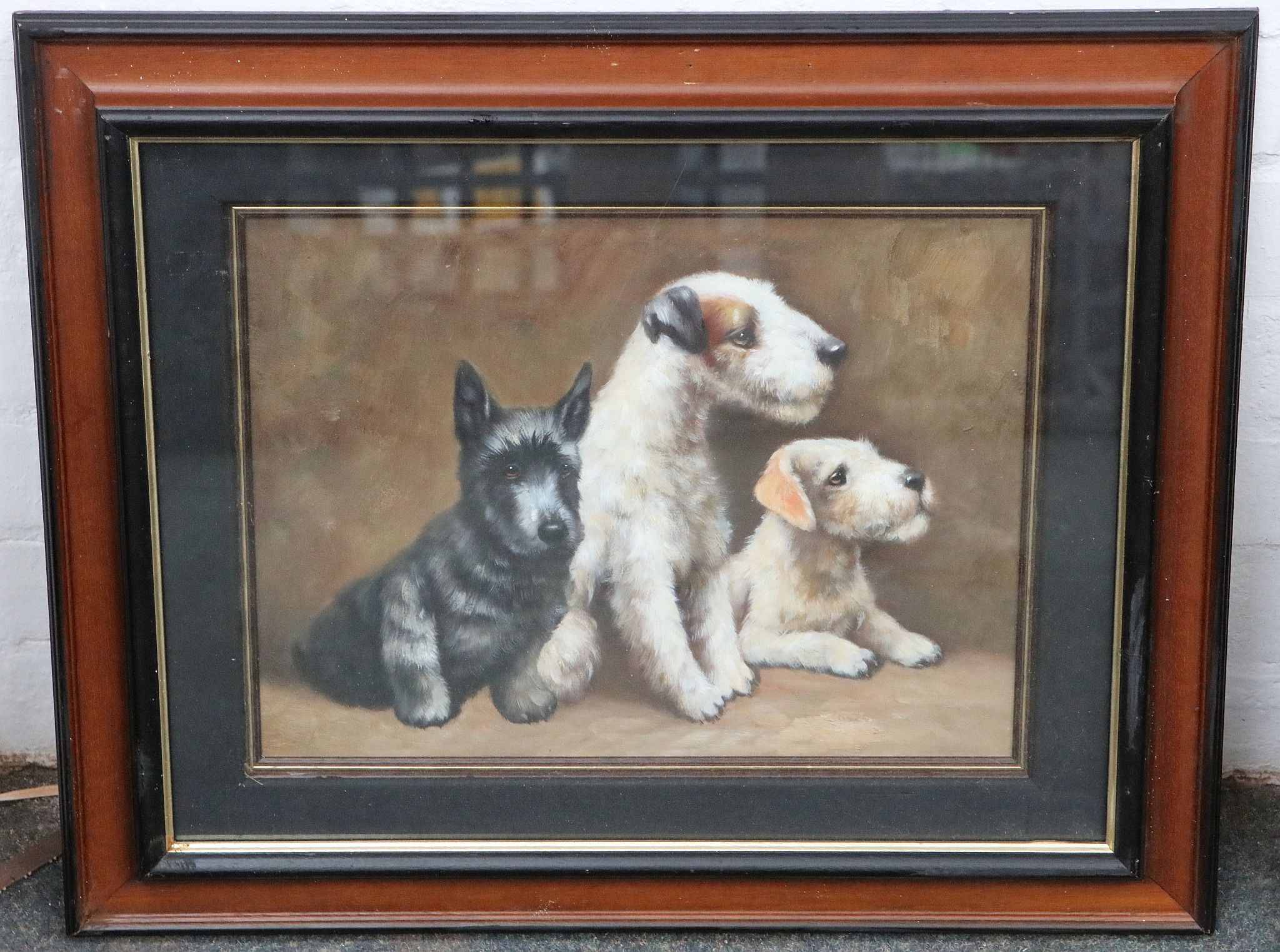 An oil painting study of three puppy Terriers, darkwood frame, 29 x 39cm.