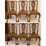 A set of six Chippendale style mahogany dining chairs, on cabriole legs with ball and claw feet.