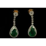 A pair of 18 carat yellow gold, diamond, and emerald drop pendant earrings, each suspended pear