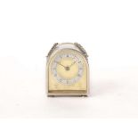 A SILVER LIMITED EDITION MINIATURE DESK TIMEPIECE