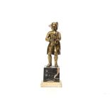 A 17TH CENTURY DUTCH GILT BRASS GENRE FIGURE OF A