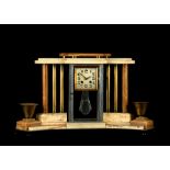 AN ART DECO COLOURED MARBLE AND BRASS MANTEL CLOCK