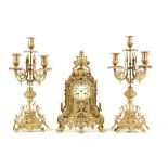 A LATE 19TH CENTURY FRENCH BRASS CLOCK GARNITURE