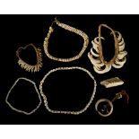 SIX NECKLACES AND ORNAMENTS, PAPUA NEW GUINEA Including a pendant of cowrie shells and boar tusks, a