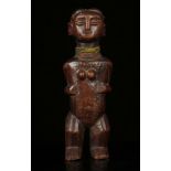 A WOOD FEMALE FIGURE, DEMOCRATIC REPUBLIC OF CONGO Possibly Pende, with scarification marks on