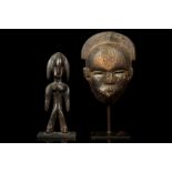 TWO AFRICAN ARTEFACTS Including a Yoruba Ogboni society mask, Nigeria, 21cm high; and a Senufo