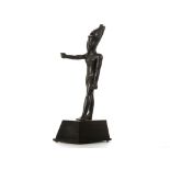 AN EGYPTIAN BRONZE FIGURE OF IHY Late Period, circa 664-332 B.C. The god depicted standing nude,