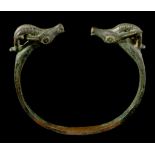 A LURISTAN BRONZE BRACELET Iran, circa 9th-7th Century B.C. Finely decorated with incised bands of