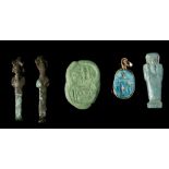 FOUR EGYPTIAN ANTIQUITIES New Kingdom to Late Period, circa 1550-332 B.C. Including a bright blue
