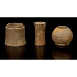 THREE COPTIC WOOD KOHL VESSELS Circa 6th Century A.D. Including one of spherical shape with flat