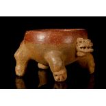 A PRE-COLUMBIAN POTTERY ZOOMORPHIC BOWL, COSTA RICA In the form of a jaguar, with applied snarling