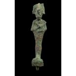 AN EGYPTIAN BRONZE FIGURE OF OSIRIS Late Period, circa 664-332 B.C. The mummiform god holding the