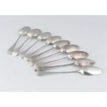 A selection of 9 Antique George II & III Sterling Silver serving spoons / tablespoons. All