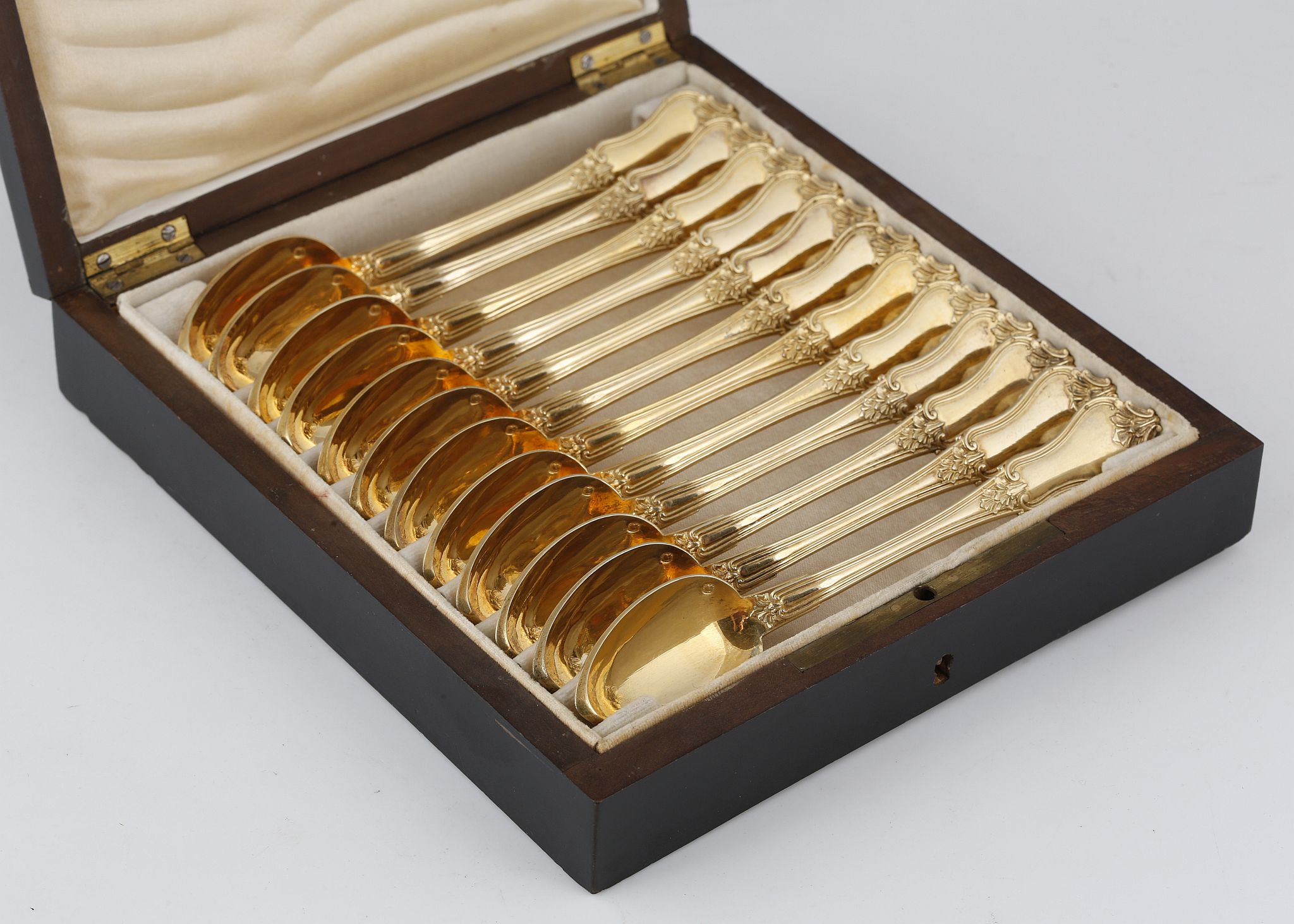 A boxed set of 12 Antique French Silver gilt teaspoons by Philippe Berthier, Paris c1845.