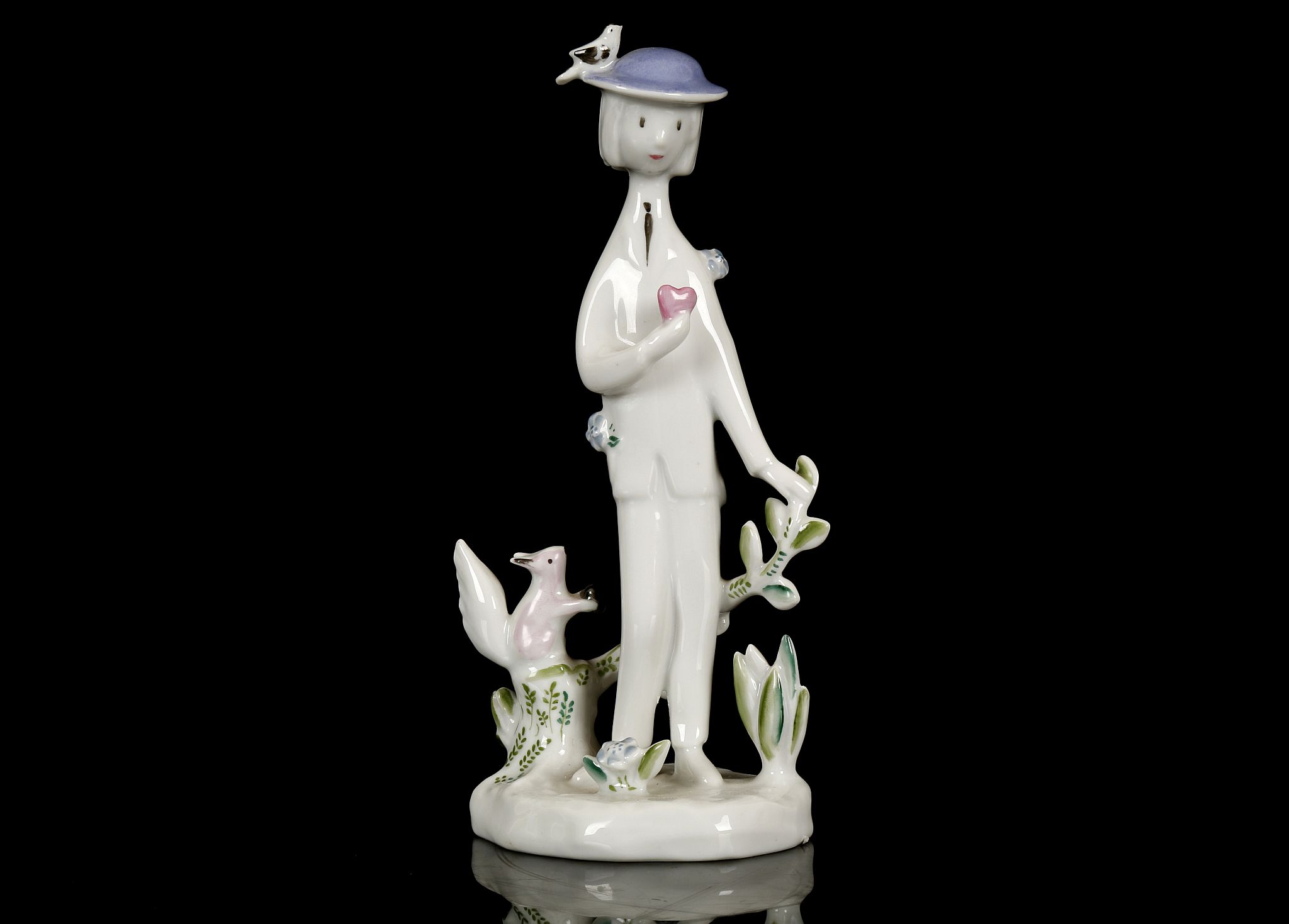 RAYMOND PEYNET FOR ROSENTHAL, a porcelain figure of a romantic Parisian young man, holding in his