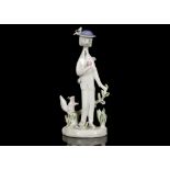 RAYMOND PEYNET FOR ROSENTHAL, a porcelain figure of a romantic Parisian young man, holding in his