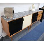 A pair of 1960's Owen Thornell sideboards, with formica top, and black and white doors, 107cm wide