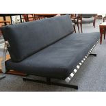 A 1960'S STEEL FRAMED SOFA BED, with fold-out back rest (181cm wide x 81cm deep).